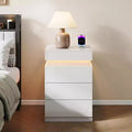 Designed for everyday convenience, this Nightstand with Built-In Charging Station and LED Lighting, 3-Drawer Sliding-Top Modern Bedside Table,.