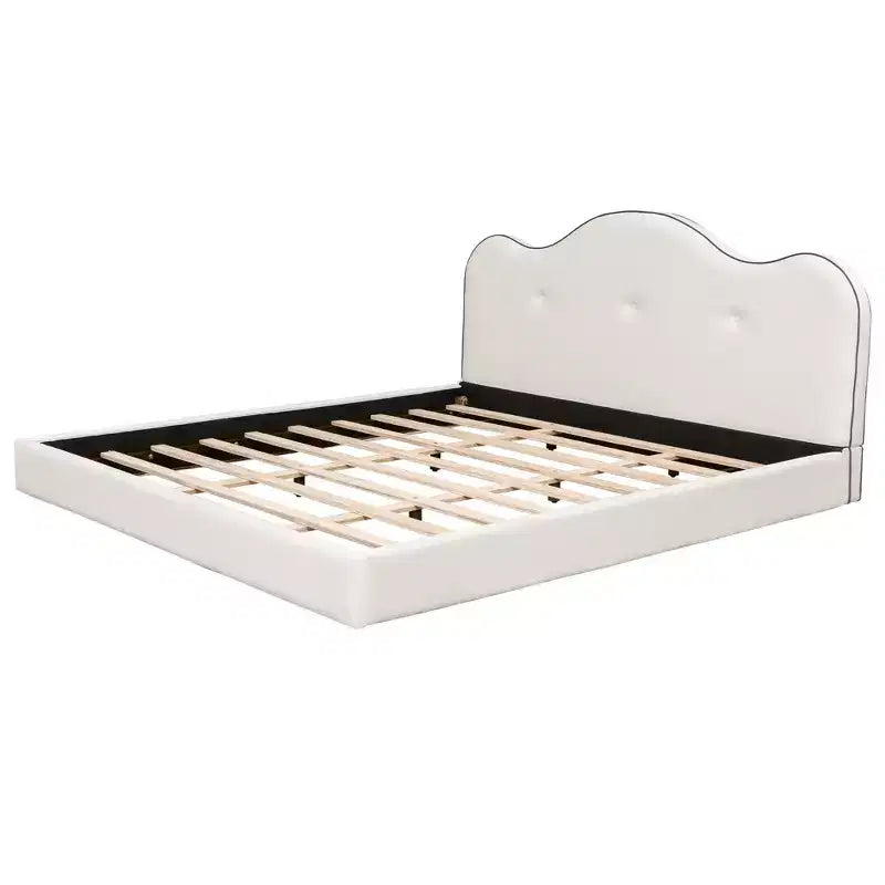 Lit plateforme capitonné en velours avec tête de lit ondulée